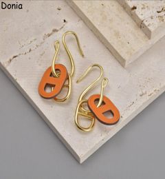 Donia jewelry luxury stud European and American fashion pig nose titanium steel fourcolor creative leather designer earrings gift4042882