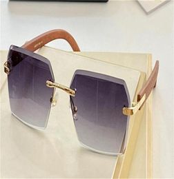 Selling fashion design sunglasses 0126 square rimless frame cut lens wooden printing temple top quality uv400 protective eyewear3888105