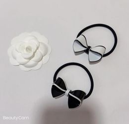 Party gifts fashion black and white acrylic bow head rope elastic rubber band C hair tie for ladies Favourite headdress accessories7731627