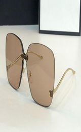 New 0352 Designer Sunglasses For Women Fashion Wrap Sunglass Frameless Coating Mirror Lens Carbon Fibre Legs Summer Style top qual6459280