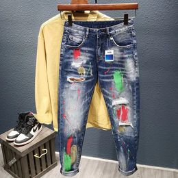 Mens Graffiti Jeans Fashion Spray Paint Ripped Hole Personality Hip-hop Streetwear Male Clothing Slim Youth Denim Trousers 240422