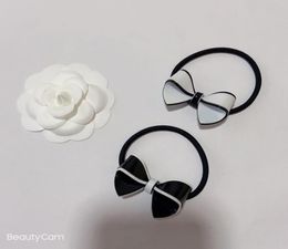 Party gifts fashion black and white acrylic bow head rope elastic rubber band C hair tie for ladies Favourite headdress accessories5589789