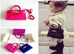 1 Famous Kids Handbags Toddler Baby Girls Princess Purses Fashion Lichee Pattern Candy Colors Messenger Bags Children Birthday Gif9890430