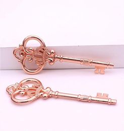 Charms Sweet Bell 10pcslot 3284mm Rose Gold Antique Metal Alloy Lovely Large Crown Key Vintage Jewelry Keys D0182118646623