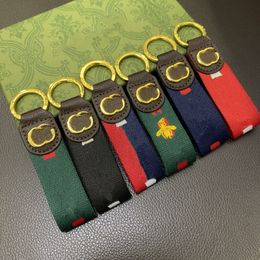 2024 New Handmade Designer Keychains Dragonne Multicolor Key Chain Men Men Men Brown Leather Bag Carteira Bated Acessórios Gold Dragonne Keychain Letter