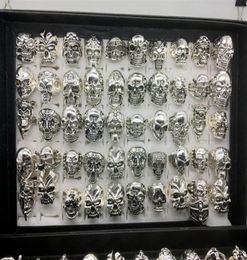 Whole 50pcs lot Gothic Big Skull Ring Bohemian Punk Vintage Antique Silver Mix Style Mens Fashion Jewellery Skeleton Ring Size 2261c2678721