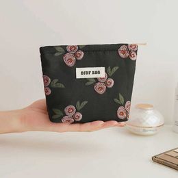 Cosmetic Organiser Womens cosmetic bag small black rose portable large capacity lipstick sanitary napkin storage bag commuter coin purse Y240503