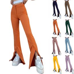 Mulheres de estilo europeu e americano Mulheres na moda calças de médio peso de peso médio elegante e versátil e lazer calças de cores sólidas divididas AST8449