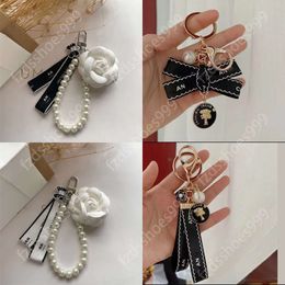 Дизайнерская сумка для ключей модные модные тренд автомобиль Keyring Flower Pearl Клавиатура Высококачественный подарки подарки отлично