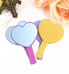 DHL Heart Shaped Travel Handheld Mirror Cosmetic Hand Mirror with Handle Makeup Mirrors Cute love shape Cosmetic Tool LX25733506577