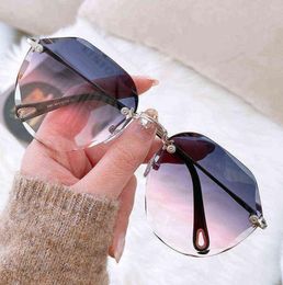 Sunglasses fashion frameless Womens round face polygonal cut edge glasses street po UV protection4589468