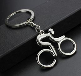 20pcsLot Metal Riding Bicycle Keychain Fashion Sports Key Chains Cool Man Bag Pendants Charm Female Accessory Jewellery Whole6489692