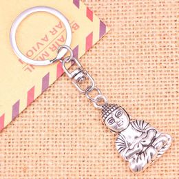 Keychains 20pcs Fashion Keychain 39 23 Mm Meditate Buddha Pendants DIY Men Jewelry Car Key Chain Ring Holder Souvenir For Gift