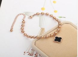 Fourleaf clover seven small daisies bracelets bells long life lock bracelet butterfly tassel pendant beads anklet jewelry2516669