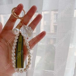 keychain designer key chain portachiavi Bag hanging ornaments lace pearl bow metal Lover key chain llaveros gift Pearl shell