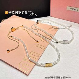 Chokers designer Miss Miao's New Spring 24 Pulling Pearl Necklace Fashionable, Light Luxury, Various Wearing Methods, Grand Sweater Chain 1AJZ