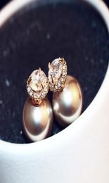 New Korean exquisite fashion twocolor pop pearl earrings wear doublesided highend champagne pearl earrings super flash zircon e5130505