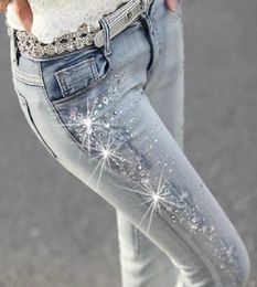 New women diamond drilled hole jeans woman pencil Ripped trousers with Rhine Denim Pants Woman LJ2010297556707