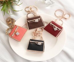 Fashion luxury keychain ornaments Party Favour creative leather bag custom metal car pendant small gifts individual package3761279