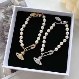 Designer Brand Saturn Pearl Brooch bracelet female INS minority high-grade light luxury versatile fashion Jewellery