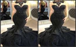 2020 New Stunning Black Long Evening Dresses Beaded Appliqued Cascading Ruffled Mermaid Court Train Backless Formal Party Prom Gow7361690