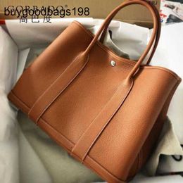 Designer Garden Bags Tote Boutique Genuine Leather Womens 2024 New Top Layer Cowhide 30 Large Capacity Handheld Shopping Water Have Logo