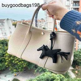 Designer Garden Party Bags 2024 New Leather Womens Bag with One Shoulder Diagonal Cross Tote Versatile Portable Shopping Bucket Have Logo
