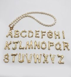 European and American -border freshwater pearl 26 English alphabet stainless steel buckle gold pendant necklace beaded pearl jewelry9120762