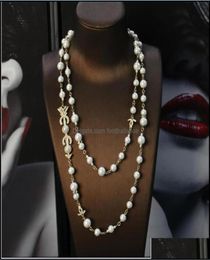Pendant Necklaces Pendants Jewelry Autumn And Winter Bow Arrow Letter Pearl Long Sweater Chain Fashion Temperament Versatile Dro8131584