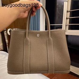 Designer Garden Party Bags Top Layer Cowhide Bag New Genuine Leather Womens Tote Portable Large Capacity Shopping Wedding Have Logo Aozt