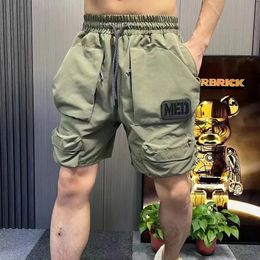 Mens summer shorts pocket one-fifth pants mens elastic waist cargo pants Ins beach pants sports shorts mens 240430