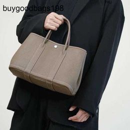 Designer Garden Party Bags Jin Yan Bag High Quality Togo Cowhide Lychee Pattern Womens Hand Simple Tote Have Logo