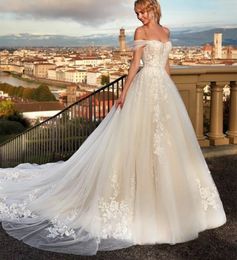 Classy Long Off Shoulder Lace Wedding Dresses A-Line Ivory Tulle Sweep Train Lace Up Back Simple Bridal Gowns for Women