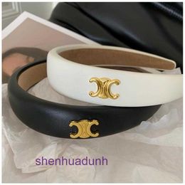 Fashion Clips for women and girls online store Triumphal Arch leather hair band French style raised skull top wide edge pressed to show small face versatile and fash