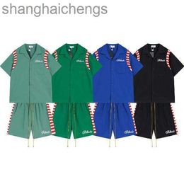 ファッショナブルなルーダーデザイナーシャツファッションラベルパッチワークかぎ針編み編み式半袖シャツ夏ルーズショーツストライプカジュアルセット