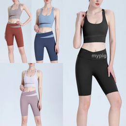 Coloured yoga suit for women high-strength herringbone shock-absorbing sports underwear fitness running tight fitting two-piece shorts set summer hot selling