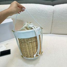 High-end brand Beach Bag Women's Handbag purse Summer vacation casual fashion design Vegetable basket Handmade straw bucket bag New leather drawstring shoulder bags