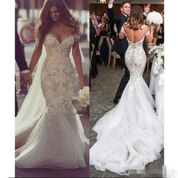 CAP ärmar 2020 Modest Mermaid Dresses Short Lace Applique V Neck Sweep Train Dubai Pärled Wedding Bridal Clown