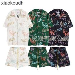 Rhude High end designer clothes for trendy full print letters casual short sleeved shirt set for men and women high street shirts With 1:1 original labels