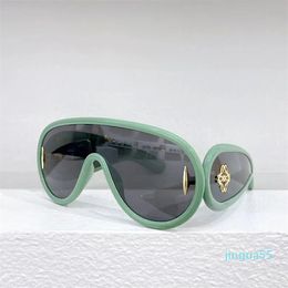 Designer Cool Sunglasses Logo Glasses for Men and Women Wing Shaped One Piece Lens Anti glare UV400 Sunglasses