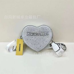 designer bags Luxury handbag Womens 2024 Summer Trendy and Personalised Sparkling Diamond Texture Shoulder Heart shaped Bag with Western Style Crossbody Bags