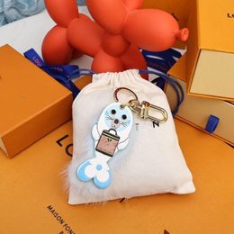 Designer Coulples Sunflower Key Wallet Luxury Brand Fawn Sea Lion Hairball Shoulder Bag Totes Luggage Pendant Brand Keychain Women Men 261R
