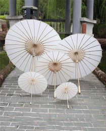 New Bridal Wedding Parasols White Paper Umbrellas Chinese Mini Craft Umbrella Diameter 20304060cm Wedding Umbrellas DHL FEDEX f5630930