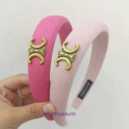 New Korean version versatile and fashionable Triumphal Arch simple hairband for women with metal mesh red satin style pink