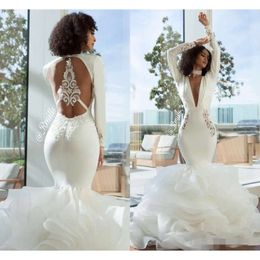 Långa ärmar blygsamma 2019 sexiga klänningar sjöjungfru rygglös organza spets appliced ​​tiered kjol ruffles plunging bröllop brudklänning
