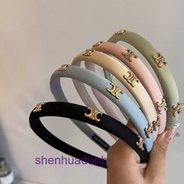 Korean niche letter headband light luxury temperament pressure hair raised skull top clip fashionable and versatile accessories