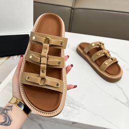 Elegant Calfskin Gladiator Slide Sandals with a Touch of Triumph Designer Sandals for Women Mules Flats Slippers