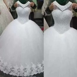 Ball Hochzeit Perlenkleider Kleid Brautperlen ärmellose Juwel Hals Tüll maßgeschneiderte bodenlange Strandspitze Applikze Schloss Vestido de Novia