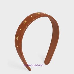 French style new Triumphal Arch hairband womens trendy leather hair clip Maillard Colour headband high-end accessory