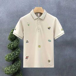 Men's T-Shirts Mens ClothPatchwork PrintOffice Simple Mens Lapel Zipper Short Sleeve Button Business Casual T-shirt J240506